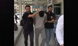 Tartıştığı kişiyi başına taşla vurarak yaraladı