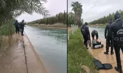 Serinlemek için sulama kanalına giren 1'i çocuk 2 kişi akıntıya kapılarak kayboldu