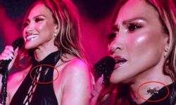 Jennifer Lopez konserde elbisesinin içine giren böcekle mücadele etti
