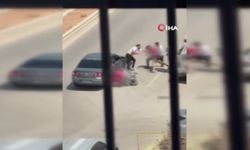 Otomobilden inen şahıslar tartıştıkları motokuryeyi tekme tokat dövdü