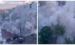 Ağır hasarlı bina tek dokunuşla çöktü