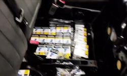 Sınır kapısında kaçak silah ve sigara operasyonu: Minibüste gizlenmiş cephanelik ortaya çıkarıldı