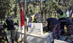 Torbalı’da şehit kabirlerine yağmur sonrası hummalı bakım