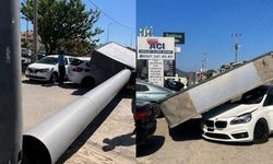 Market tabelası d*hşet saçtı: Araçlar zarar gördü!