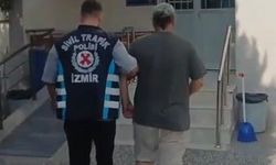 İzmir’de motosikletli kuryeye yol ortasında şiddet: Saldırgan sürücü yakalandı!