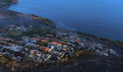 Seferihisar'daki orman yangınında 345 haneli Doğankent Sitesi’nde çok sayıda ev zarar gördü