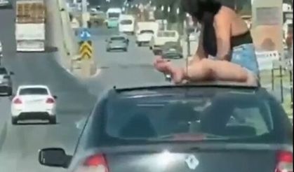 Kaputun üzerinde yolculuk yaptı, sürücüyle birlikte gözaltına alındı!