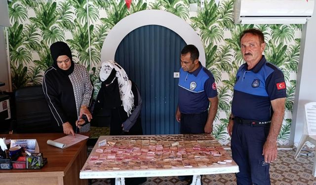Dilenci kadının yarım günlük kazancı şoke etti: Zabıta paraya el koydu!