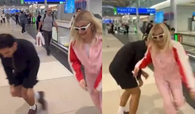 Ünlü şarkıcı havalimanında yanındaki kişi ile coşkulu dans etti