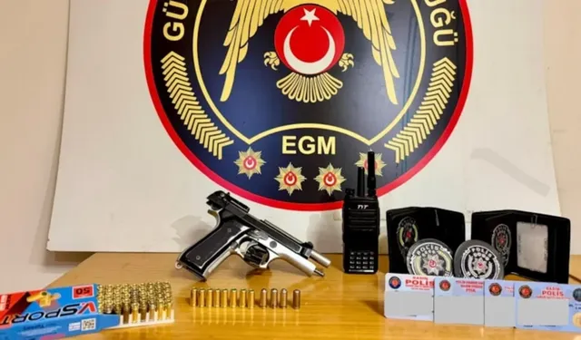 İzmir'de polis amblemiyle silah paylaşan şüpheli yakalandı