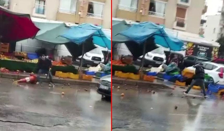 İzmir Bornova'da bir manav sinir krizi geçirerek etrafa satır ile saldırdı