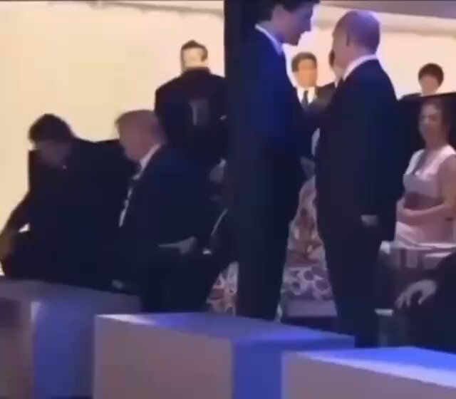 Justin Trudeau Touches Putin